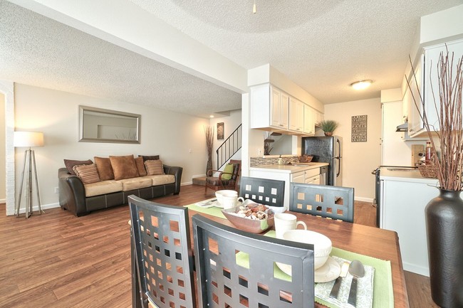 Campbell Park Apartments Model Dining Room Table and Living Room