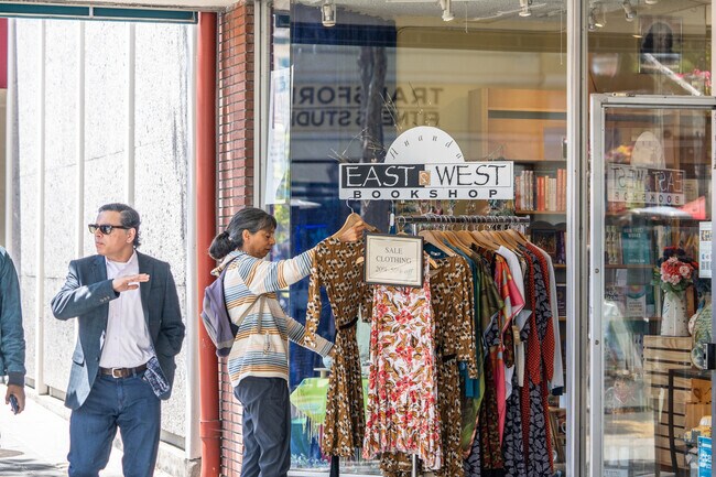 A lady shops for bargains along Castro Street in Mountain View, CA.