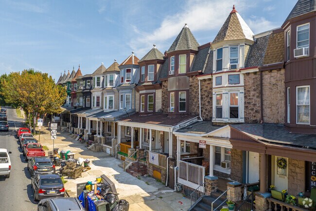 Victorian row houses featuring turrets and brick facades in Reading Center City-Berks.