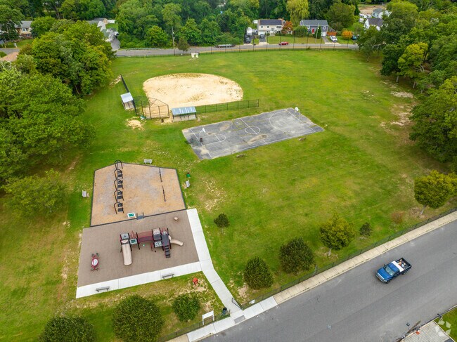 Tree-lined Beaver Dam Park anchors the Islip Terrace neighborhood.