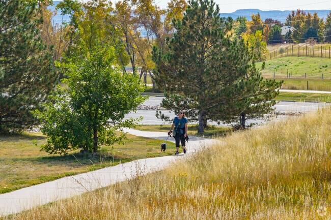 Mountain views abound as residents stroll through Deer Creek Park and Pool near Marina Pointe.
