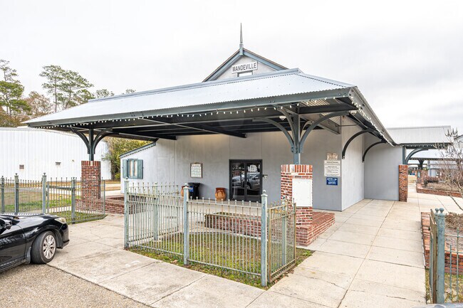 The Mandeville Trailhead of the Tammany Trace features a beautifully restored train depot and serves as a popular community gathering spot.