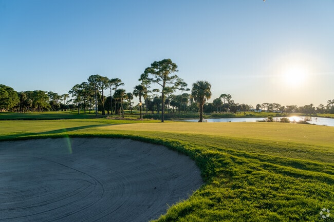 Local golf club's 18th hole putting green.
