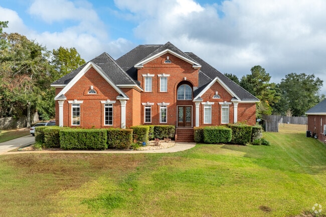Brick homes with multiple gabled roof lines can be found throughout Di Grado.