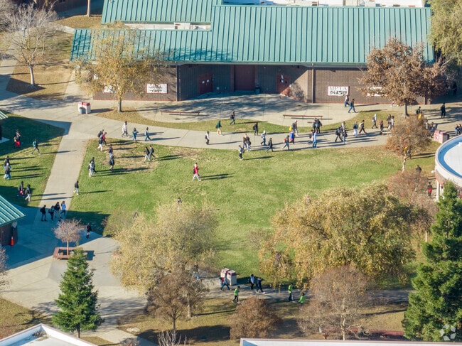 The AP participation at Laguna Creek High School is 18 percent.