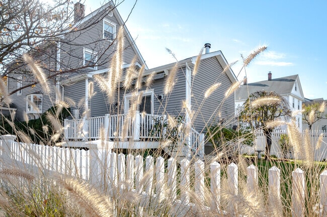 Grasses sway in the slightest breeze in the backyard of a home on Banks Place in Glenville.