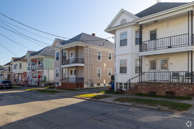 Explore a spacious multifamily home in the heart of Acushnet Station.