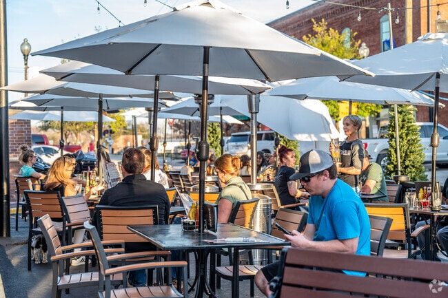 Stop by the Old Axe Brewing Co and enjoy food and drinks and downtown scenery.