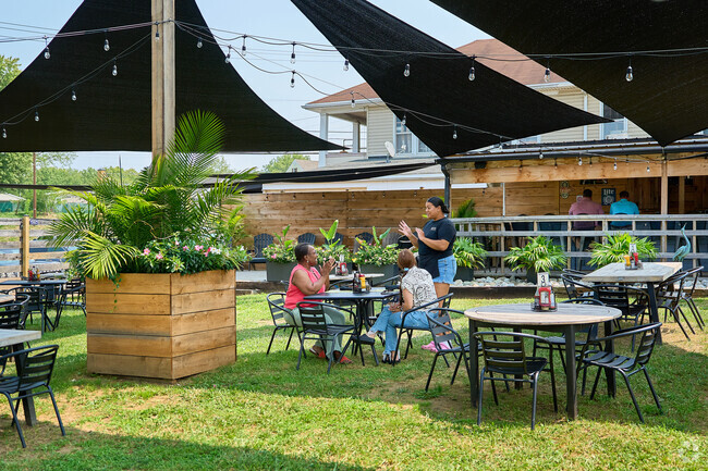 Meet up with friends and enjoy a lunch on the lawn at Fosters On The Point.