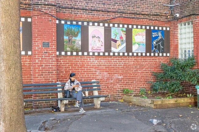 Kew Gardens Cinema Park in Queens provides solace from the grind.