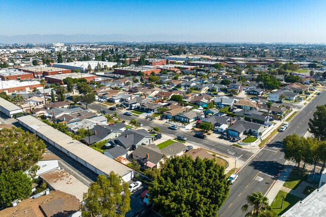 Harbor City skyline stretches north with homes, businesses, and green spaces.