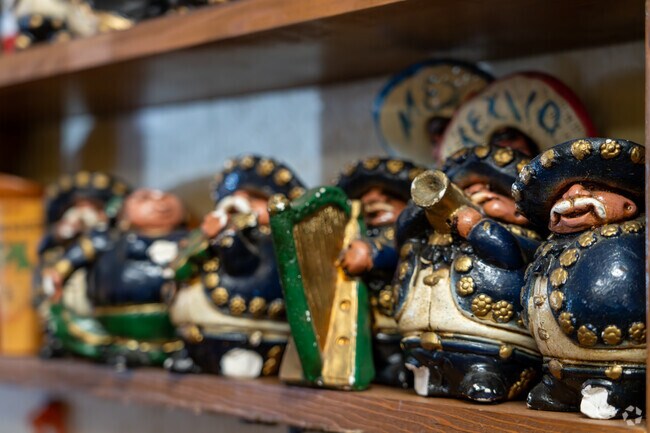 Handcrafted mariachi figurines decorate La Playita, a cozy Mexican restaurant in Crossgate.