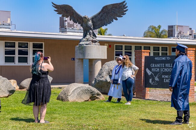 Soon to be graduates pose for photos at Granite Hills High School.