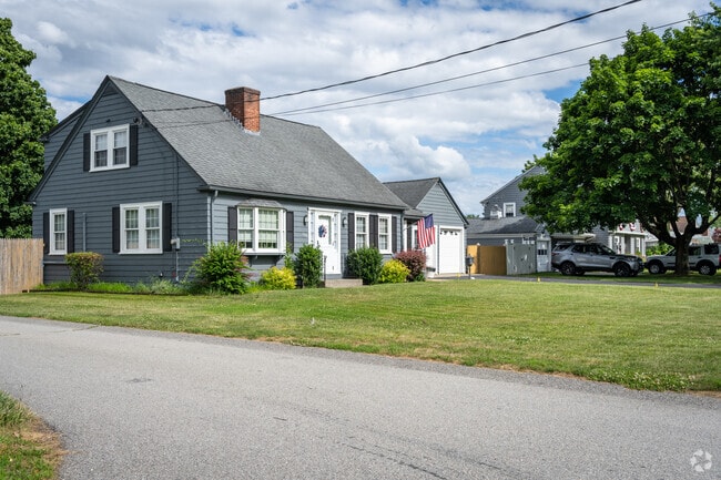 Explore North Swansea, MA's neighborhood adorned with petite Cape Cod homes.