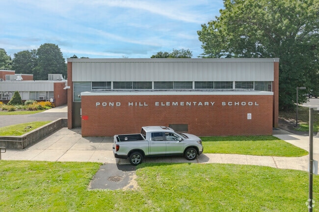 Pond Hill Elementary School is located at 299 Pond Hill Road in Wallingford, CT.