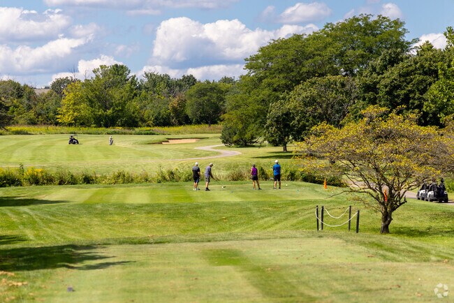 Golfers tee off at Oakwood Golf Course near Raymond, open to the public year-round.