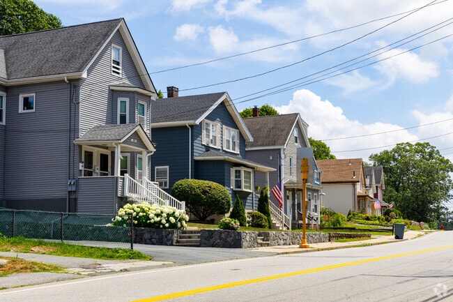 A row of classic New Englander style homes in the Pleasant Hills neighborhood of Saugus, MA.
