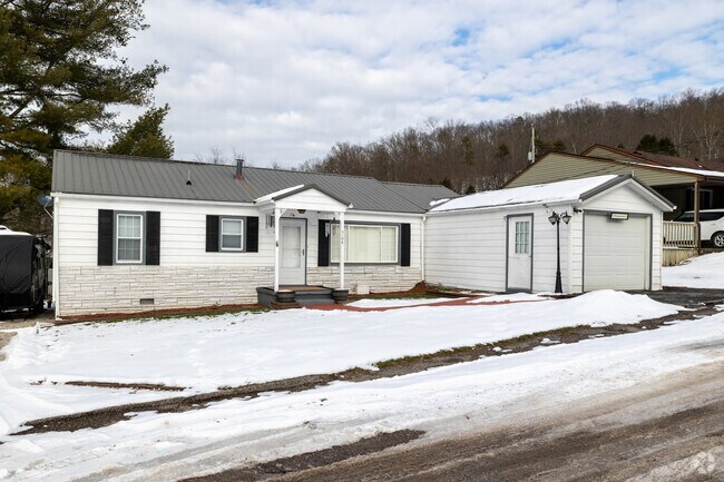 Ranch home with a attached garage added onto in Elkview.