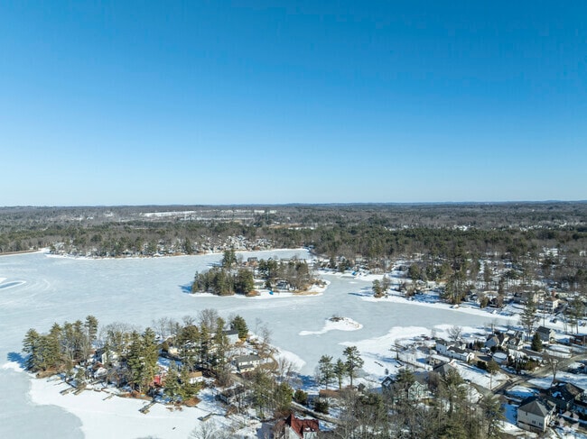 From above, Arlington Pond's beauty stretches across the landscape, a perfect retreat for lake lovers and outdoor enthusiasts.