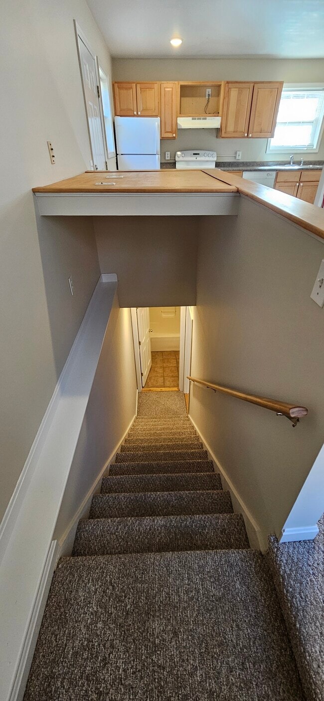 To Lower Level Bed and Bath