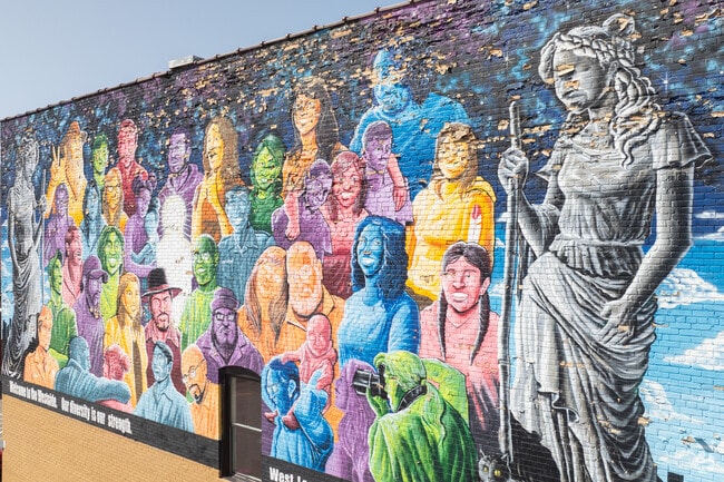 The West Grand neighborhood has some of the best building murals in all of Grand Rapids.