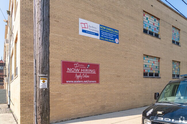 Colorful stained glass windows line the walls of the St. John Nepomuk Elementary School.
