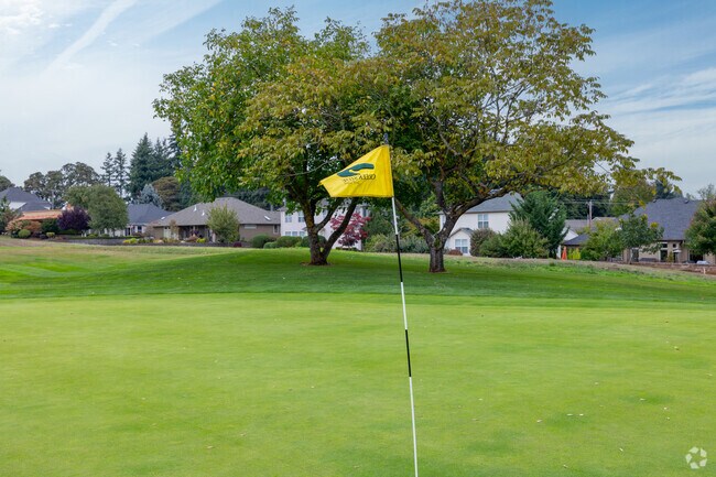 Take a swing at Creekside Golf Club on Club House Dr SE in South Gate.