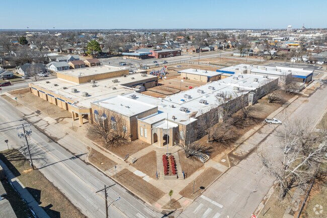 Jefferson Elementary school library has a green screen and lego wall.