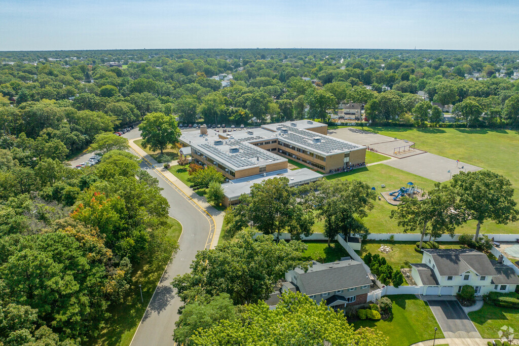 John Quincy Adams Elementary School beautifully nestled into the neighborhood of Deer Park.