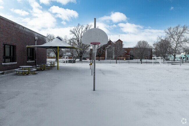 Harry St Elementary has an outdoor basketball court.