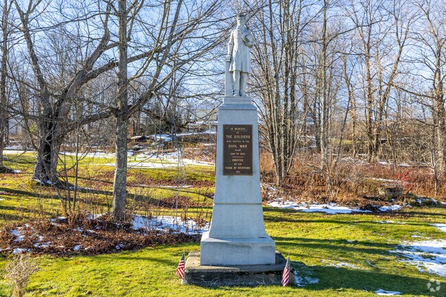A proud soldier’s monument stands quietly along the trail, honoring local veterans and offering a moment of reflection in the heart of Maple Shade, Westford.