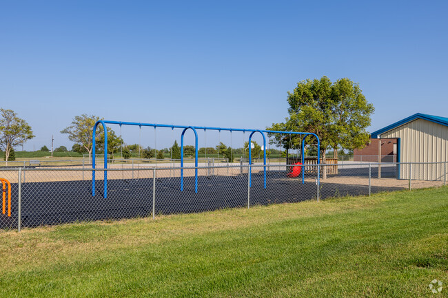 Students love the swings during recess at Norris Elementary.