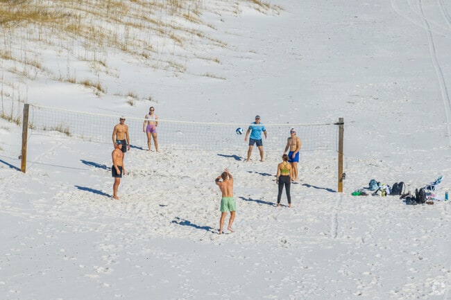 Enjoy volleyball on the white sand beaches of Pensacola Beach.
