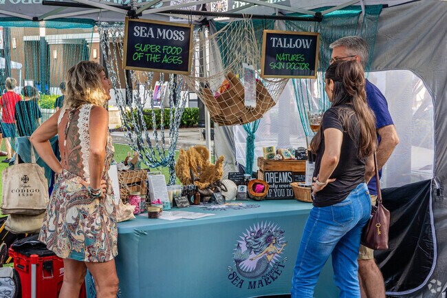 Vendors call out cheerful greetings to passerby's, describing their goods with pride at the Friday Moonlight event at the Hub at Bexley.