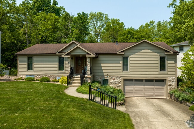 A delightful split-level style home in the Sycamore Hills neighborhood.