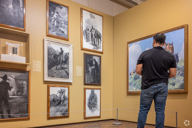 A Stark Museum visitor takes in art in Orange, TX.