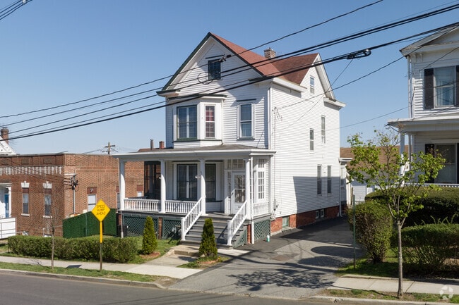 Stick-style homes with driveways and separate garages are popular in Haverstraw Village.