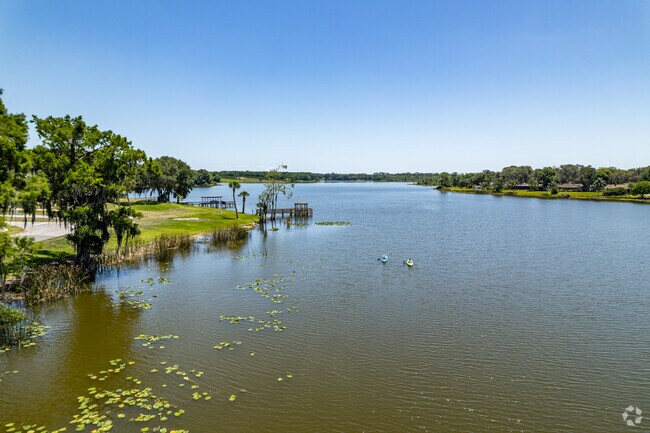 Aerial view of colorful kayakers on Lake Umatilla.