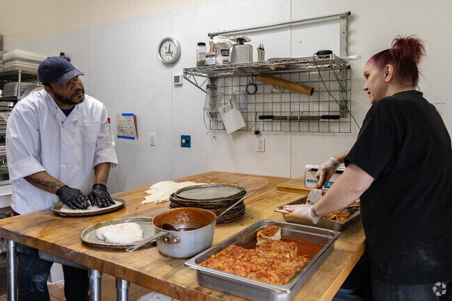 The staff at Tillie's Restaurant work on classic Italian entrees in McKeesport.