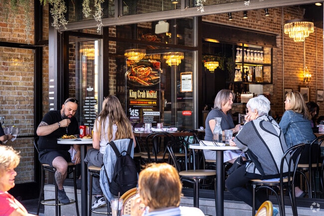 Enjoy a meal in the sun at Pennyville Station in the uptown area of Park Ridge, IL.