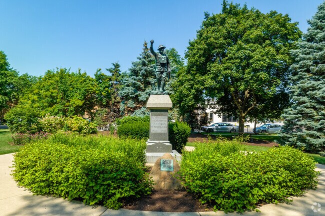 Burlington Square Park in Naperville Historic District has a statue honoring veterans.