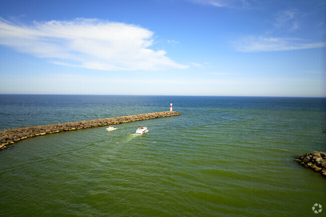 Boaters leaving Irondequoit Bay for the open waters of Lake Ontario.