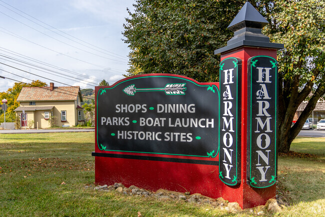 A sign directs drivers in the town of Harmony, where historic buildings await.