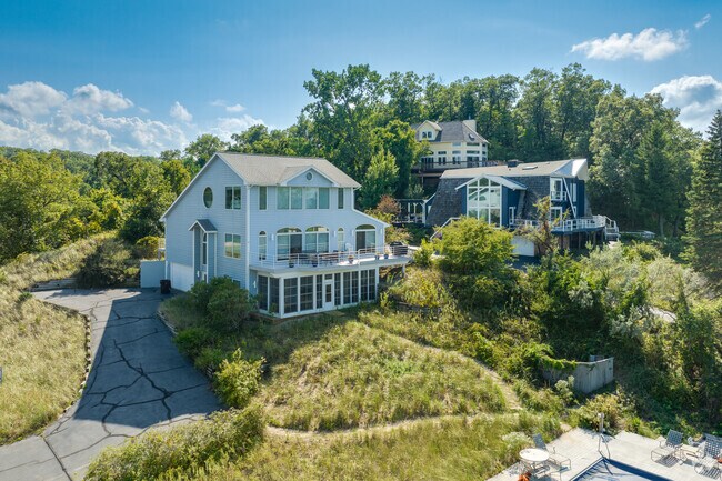 Grand homes with views of Lake Michigan built on the Dunes of Beverly Shores.