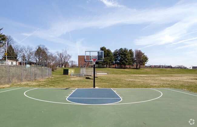 Play a game of pick-up basketball with friends at Medfield Heights Park in Medfield.