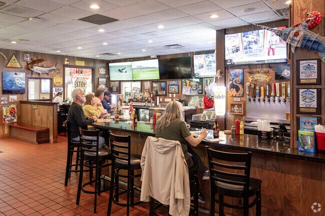 Join us for happy hour at the Brass Ring Pub in Jupiter River.