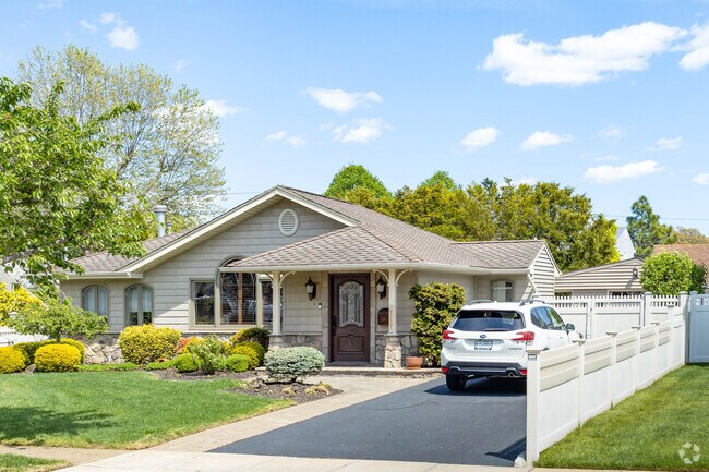 Ranch style homes with covered entrance ways are often seen in East Massapequa.