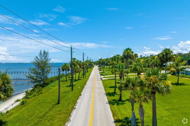 Sandhill Crossing main artery is S Indian River Dr traveling North-South.