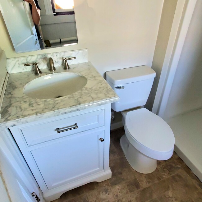 quality solid wood vanity with natural stone