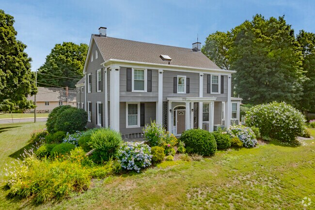 This classical home on N Main St. in Plymouth borders Balwin Park.
